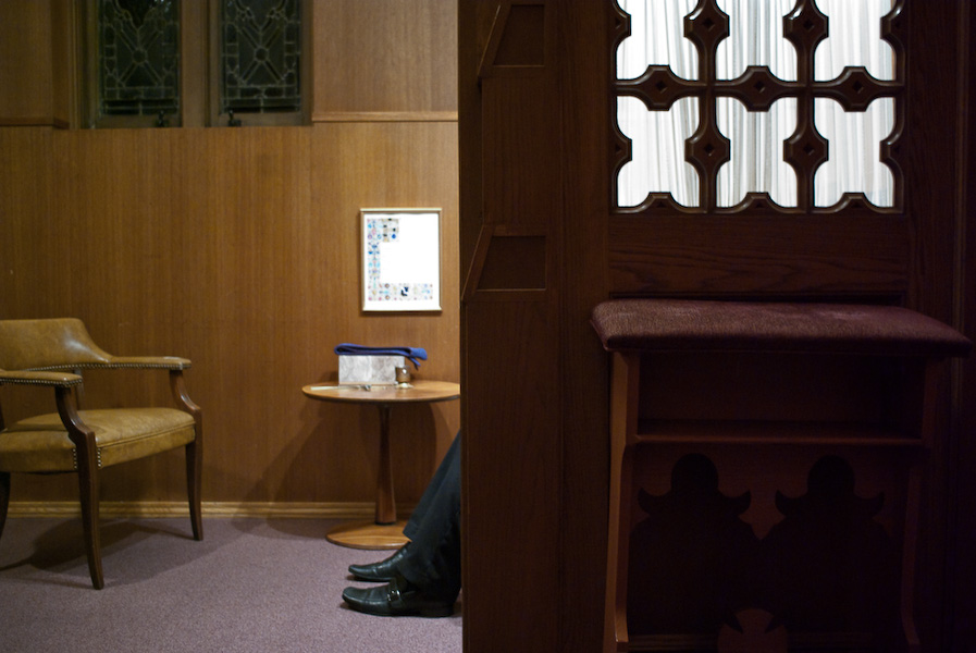 Waiting at the confessional.