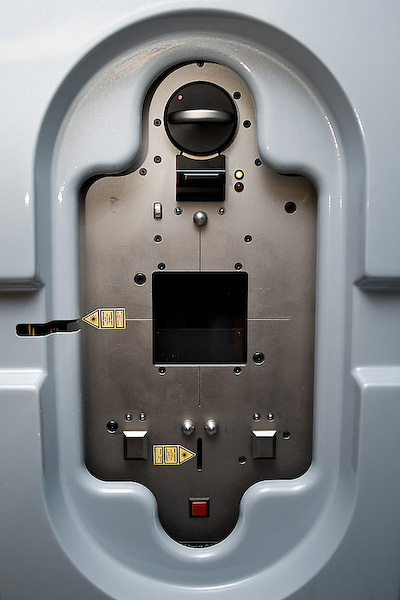 A panel on the Linear Accelerator used for imaging. The radiation comes through the black square and makes contact with a phosphorous plate to capture an image.
