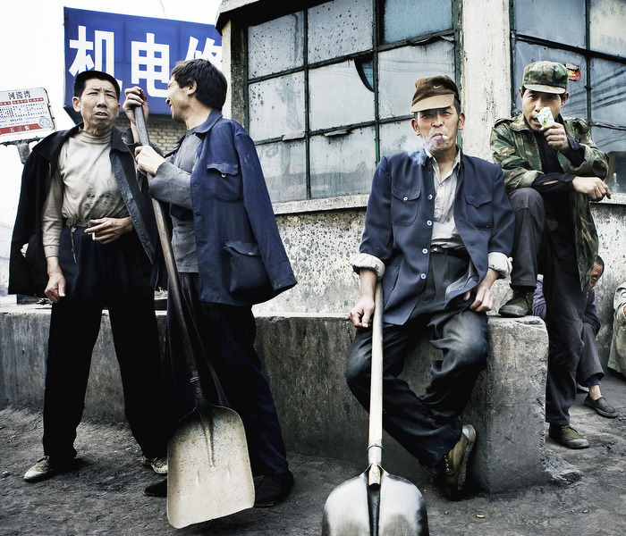Coal workers waiting for a job in downtown Taiyuan.